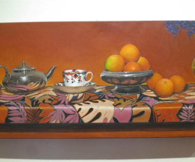 Still life with teapot, cup and oranges